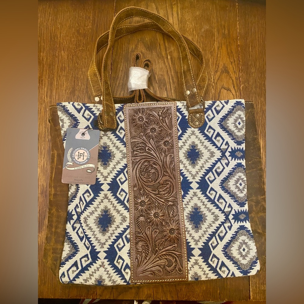 New repurposed leather with repurposed blue & white fabric